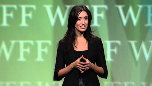 Erica Orange speaking to a crowd